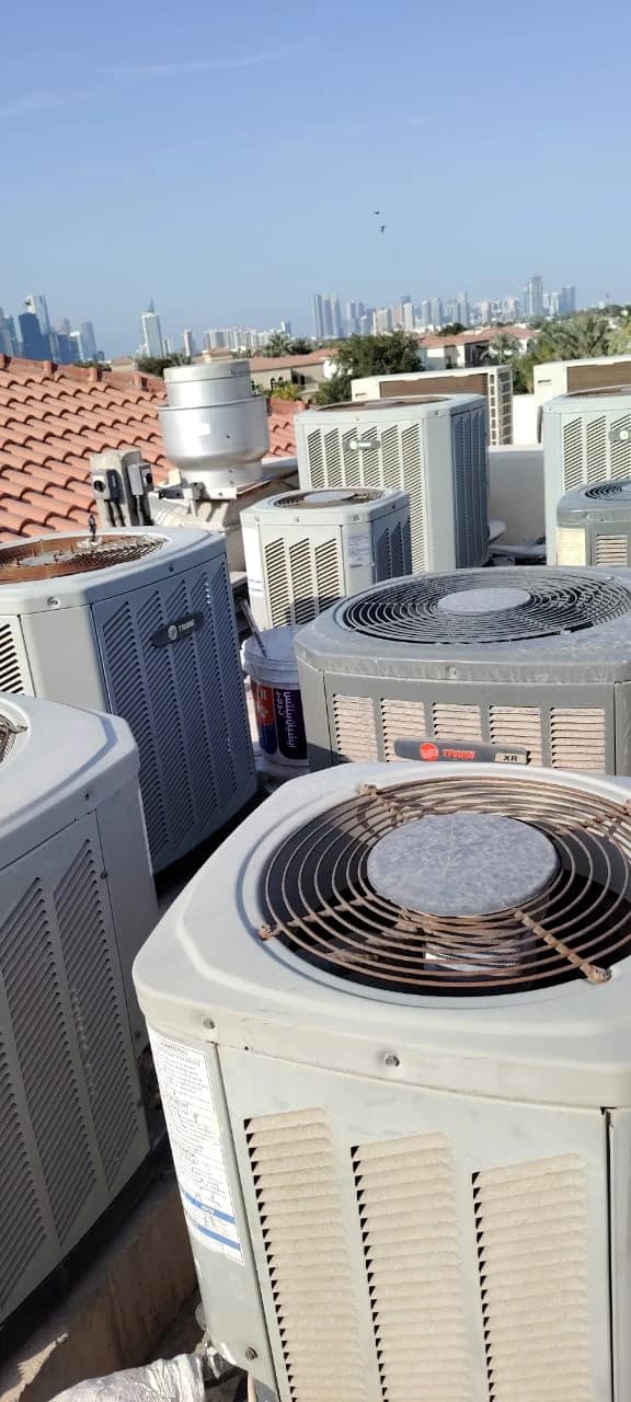 Group of condenser units on a villa rooftop